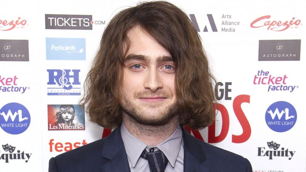 Daniel Radcliffe accepts the 2014 WhatsOnStage Award for Best Actor In a Play for The Cripple of Inishmaan on Feb. 23, 2014. 
