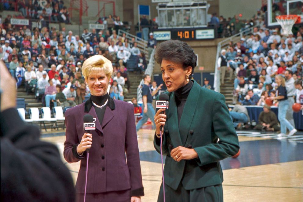 PHOTO: ESPN network commentators Mimi Griffin, left, and Robin Roberts do a pre-game report from the court, prior to a University of Connecticut women's basketball game at Gampel Pavilion in Storrs, Conn., 1995. 