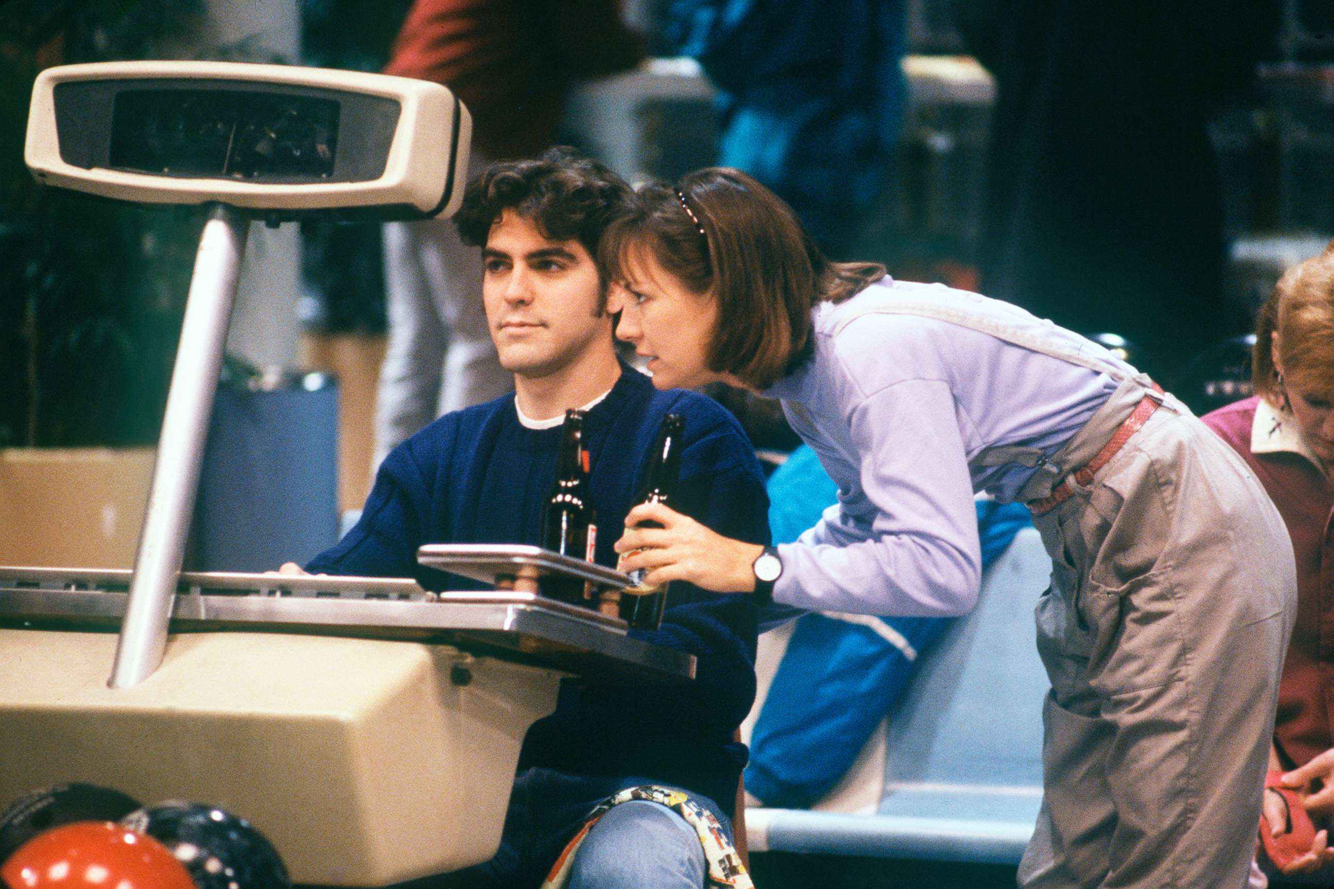 PHOTO: Laurie Metcalf, who plays Jackie, had a salacious bet on the line with Booker, played by George Clooney, on bowling night, during the "Lovers' Lane" episode of "Rosanne," Dec. 6, 1988. 