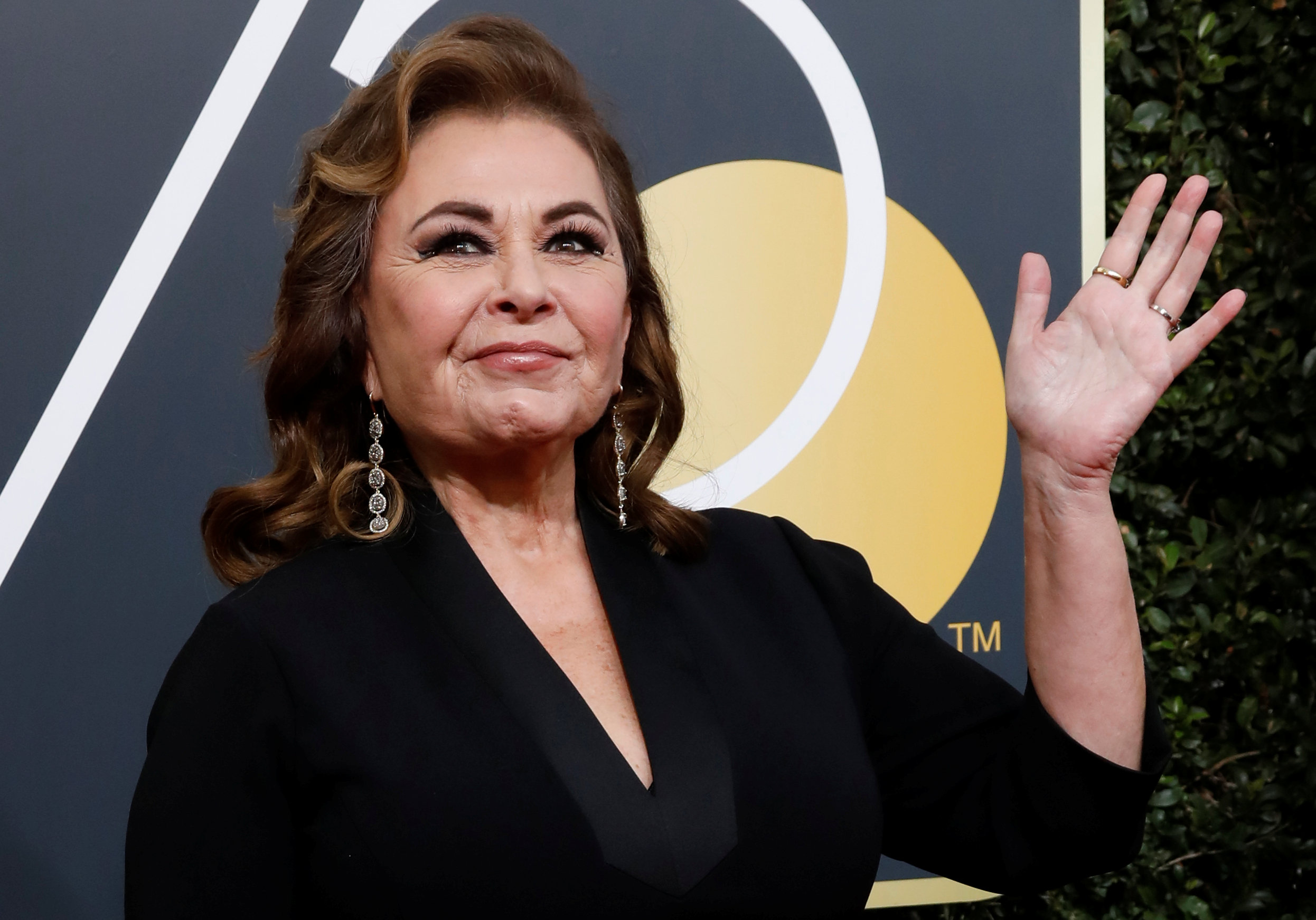 PHOTO: Roseanne Barr waves on her arrival to the 75th Golden Globe Awards in Beverly Hills, Calif., Jan. 7, 2018.