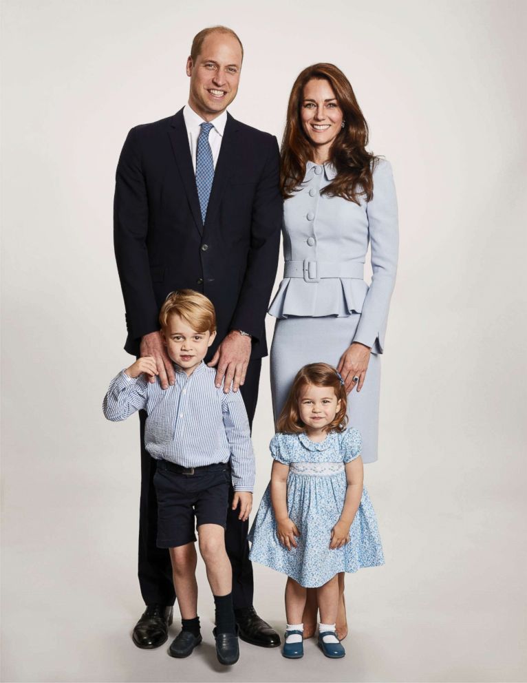 Britain's Prince William and Kate, the Duchess of Cambridge pose with their children Prince George and Princess Charlotte, at Kensington Palace in this undated photo provided by Kensington Palace. The photo has been used on the Cambridges' Christmas card.