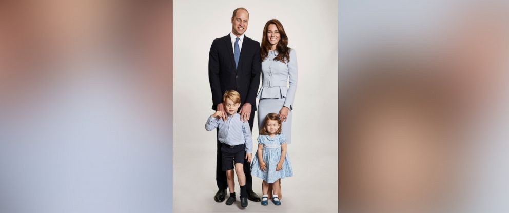 Britain's Prince William and Kate, the Duchess of Cambridge pose with their children Prince George and Princess Charlotte, at Kensington Palace in this undated photo provided by Kensington Palace. The photo has been used on the Cambridges' Christmas card.