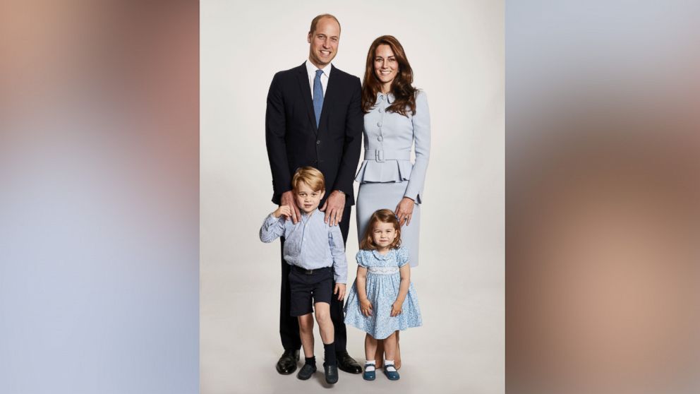 Britain's Prince William and Kate, the Duchess of Cambridge pose with their children Prince George and Princess Charlotte, at Kensington Palace in this undated photo provided by Kensington Palace. The photo has been used on the Cambridges' Christmas card.