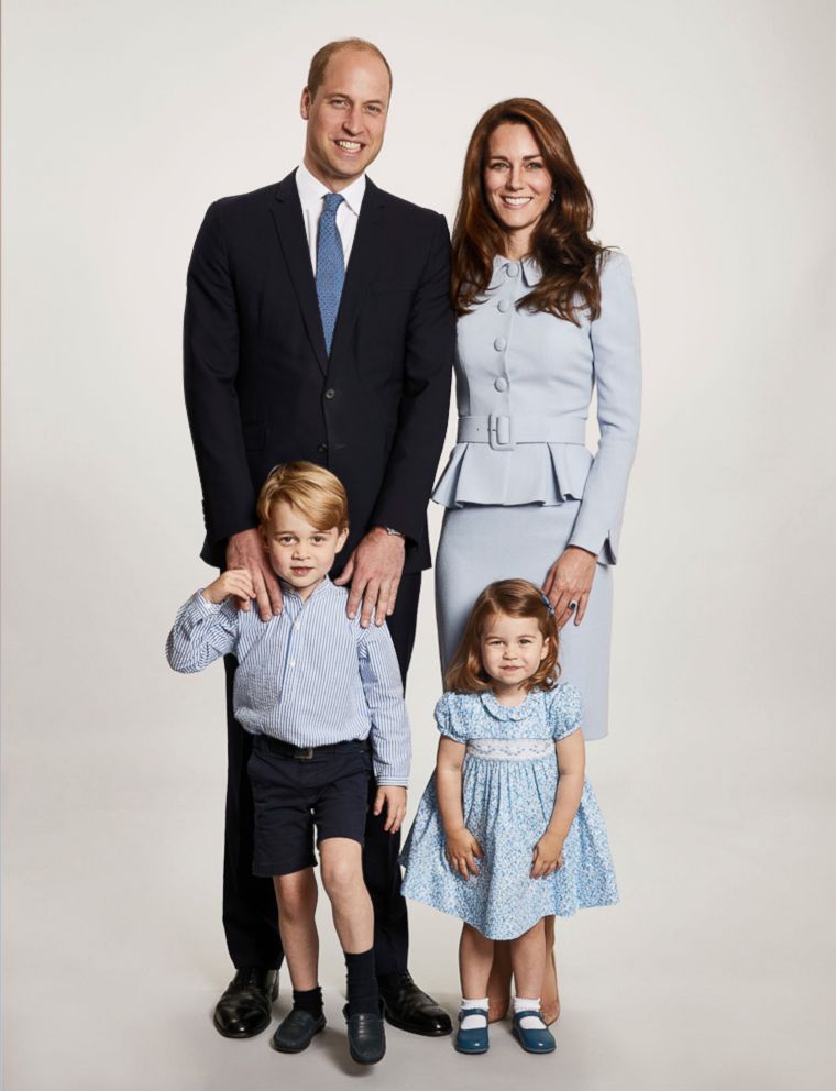 Britain's Prince William and Kate, the Duchess of Cambridge pose with their children Prince George and Princess Charlotte, at Kensington Palace in this undated photo provided by Kensington Palace. The photo has been used on the Cambridges' Christmas card.