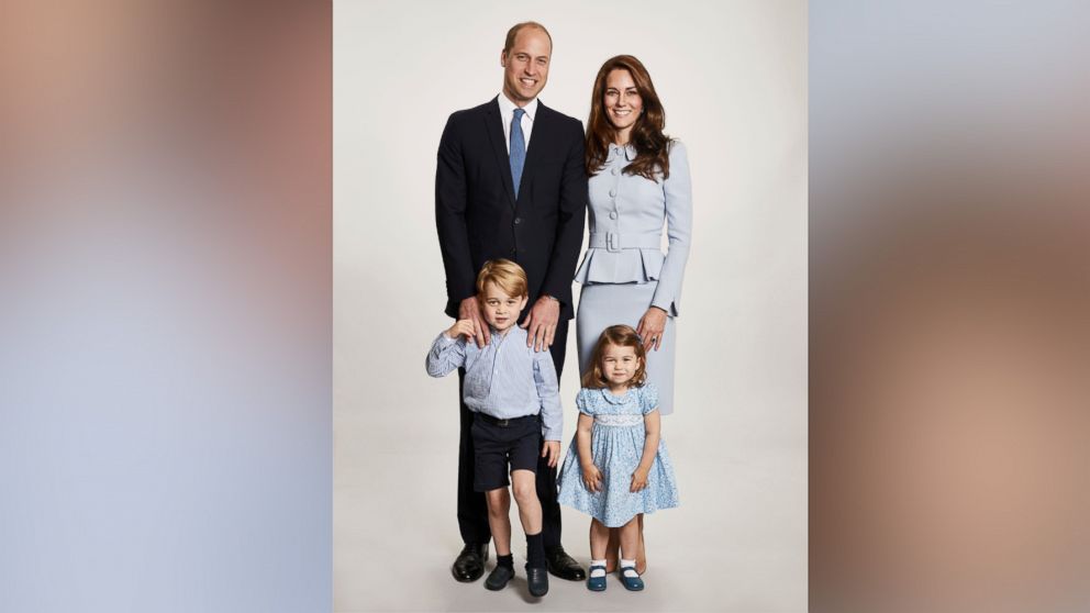 Britain's Prince William and Kate, the Duchess of Cambridge pose with their children Prince George and Princess Charlotte, at Kensington Palace in this undated photo provided by Kensington Palace.