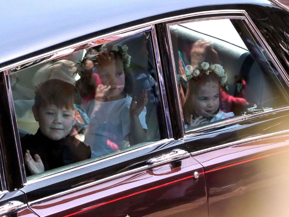 PHOTO: Princess Charlotte arrive for the wedding ceremony of Britains Prince Harry and Meghan Markle at St Georges Chapel at Windsor Castle in Windsor, May 19, 2018.