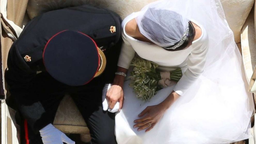 PHOTO: Prince Harry and Meghan Markle ride in an Ascot Landau along the Long Walk after their wedding in St George's Chapel in Windsor Castle in Windsor, England, May 19, 2018. 