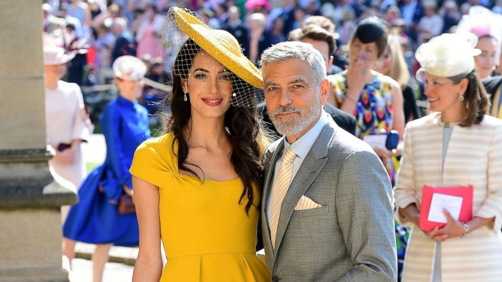 PHOTO: Amal and George Clooney arrive at St George's Chapel at Windsor Castle before the wedding of Prince Harry to Meghan Markle on May 19, 2018 in Windsor.