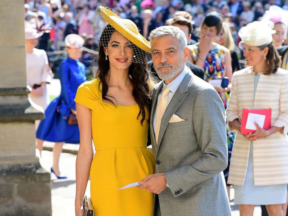 PHOTO: Amal and George Clooney arrive at St Georges Chapel at Windsor Castle before the wedding of Prince Harry to Meghan Markle on May 19, 2018 in Windsor.