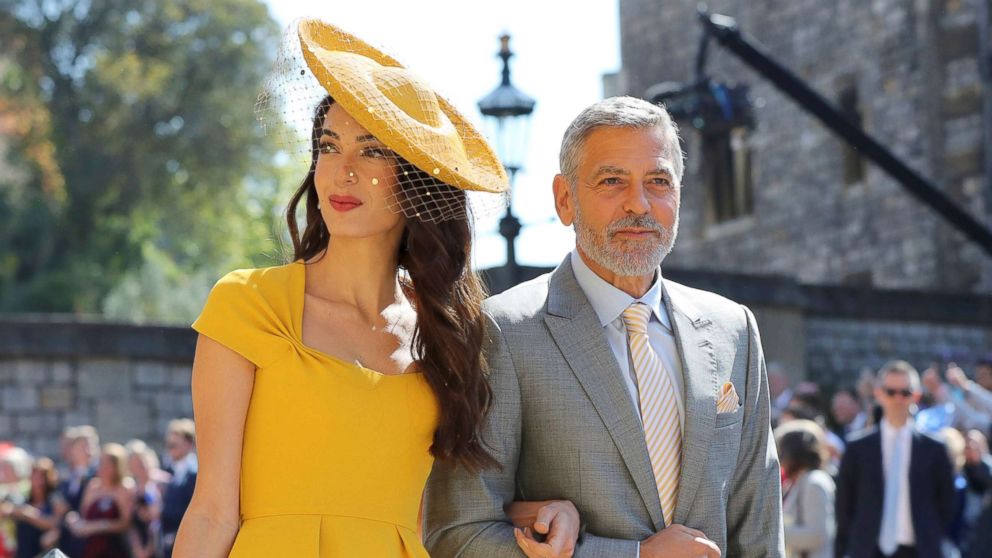 PHOTO: Amal Clooney and George Clooney arrive for the wedding ceremony of Prince Harry and Meghan Markle at St. George's Chapel in Windsor Castle in Windsor, May 19, 2018. 