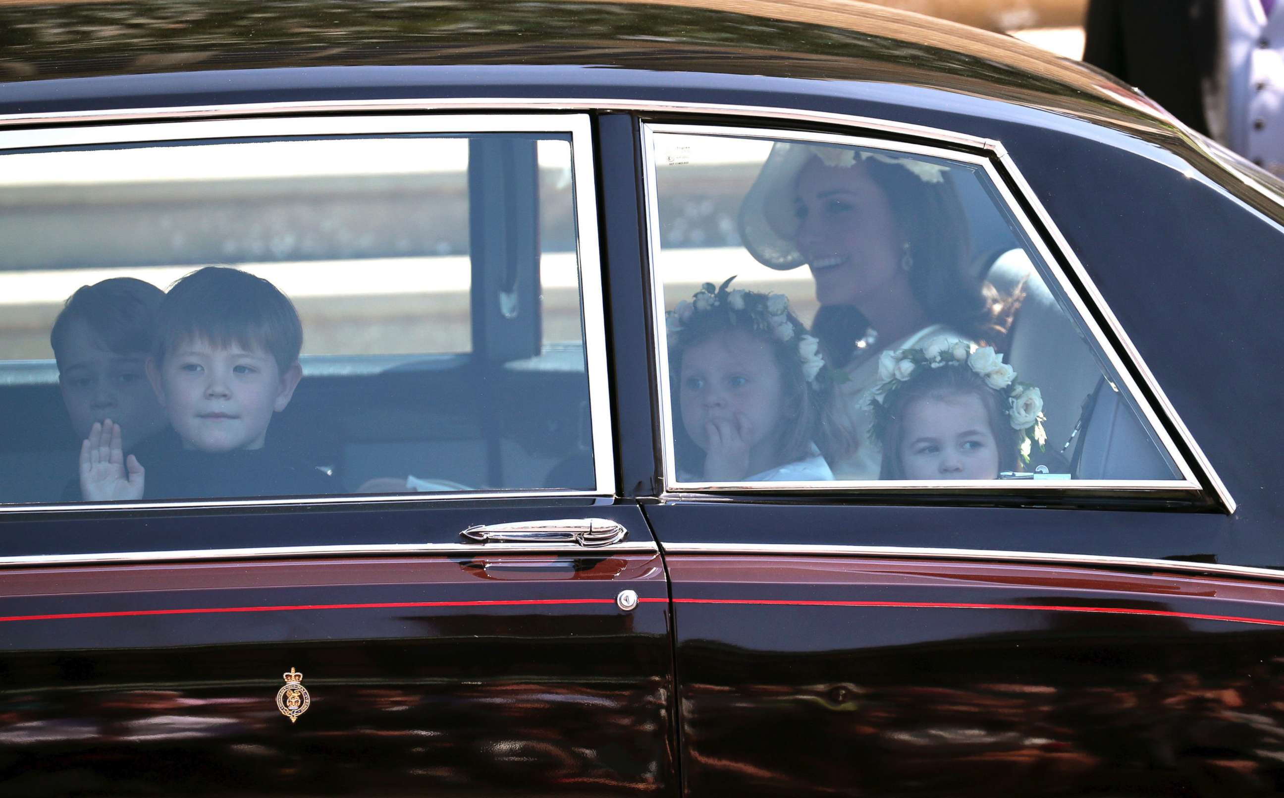 PHOTO: Kate, the Duchess of Cambridge arrives with Prince George, left and Princess Charlotte, right, for the wedding  ceremony of Prince Harry and Meghan Markle at St. George's Chapel in Windsor Castle in Windsor, May 19, 2018. 