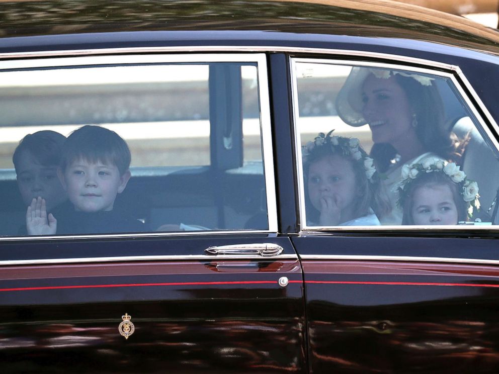 PHOTO: Kate, the Duchess of Cambridge arrives with Prince George, left and Princess Charlotte, right, for the wedding ceremony of Prince Harry and Meghan Markle at St. Georges Chapel in Windsor Castle in Windsor, May 19, 2018.