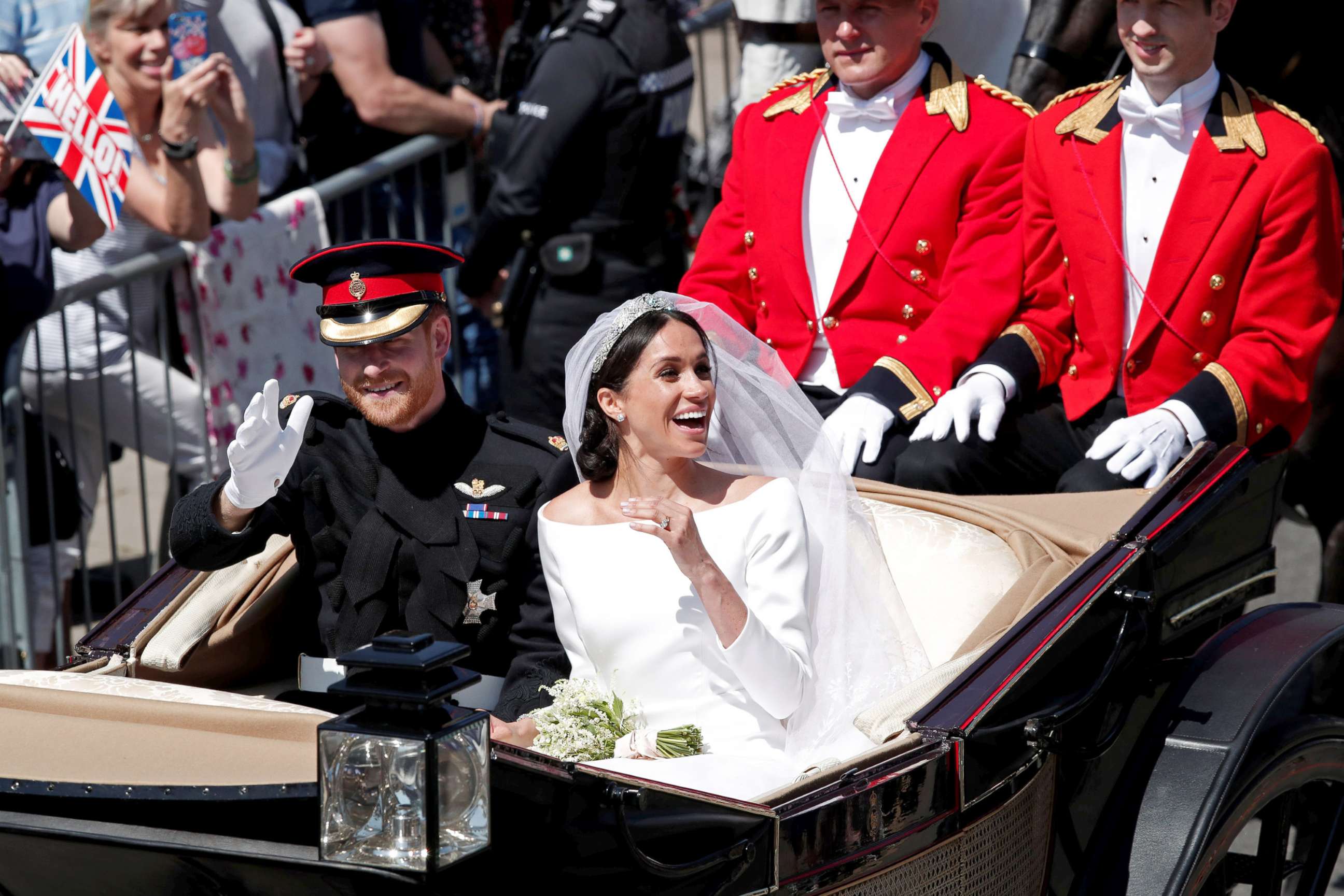 PHOTO: Prince Harry and his wife Meghan ride a horse-drawn carriage after their wedding ceremony at St George's Chapel in Windsor Castle in Windsor, May 19, 2018.