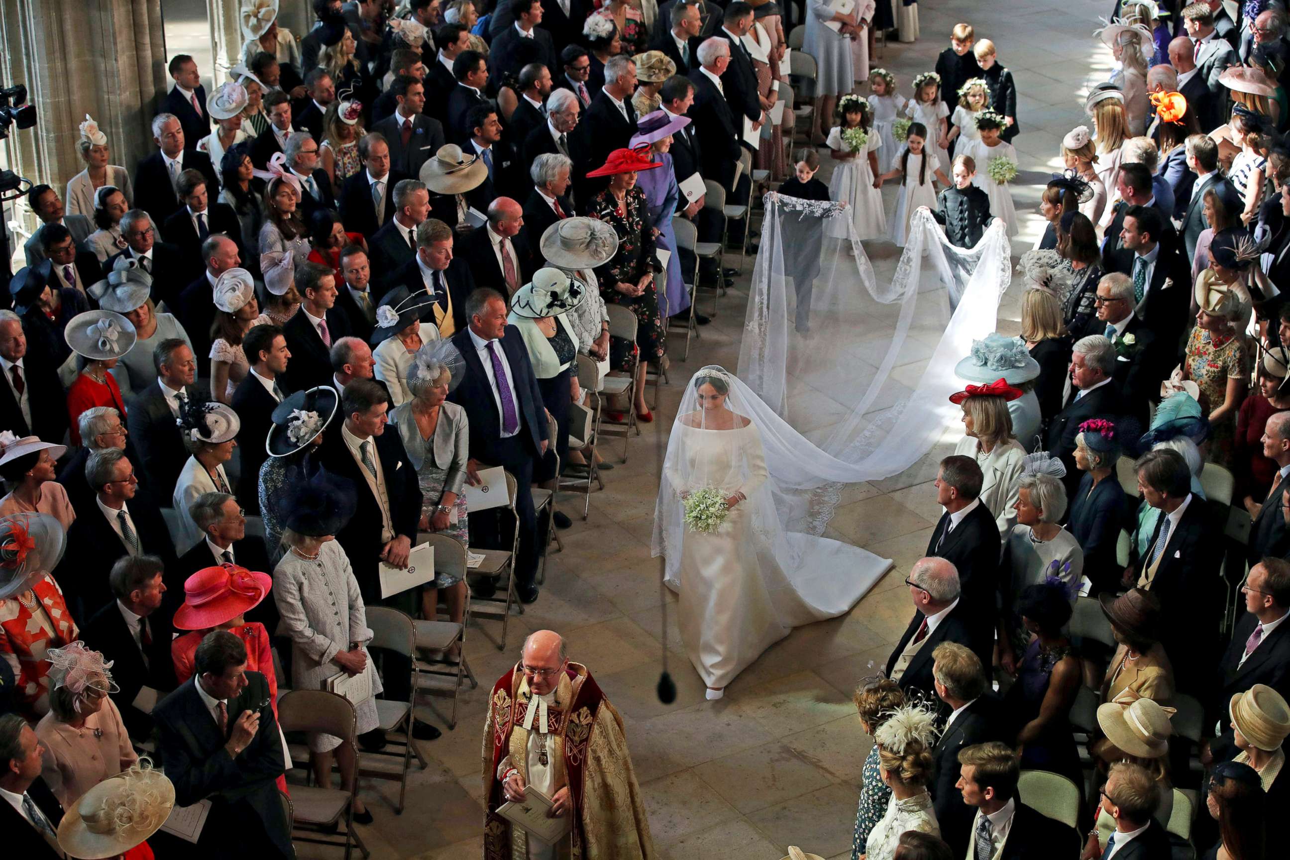 PHOTO: Meghan Markle walks down the aisle as she arrives for the wedding ceremony to Prince Harry at St. George's Chapel in Windsor Castle in Windsor, May 19, 2018. 