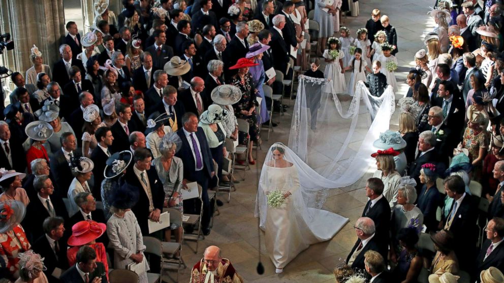 PHOTO: Meghan Markle walks down the aisle as she arrives for the wedding ceremony to Prince Harry at St. George's Chapel in Windsor Castle in Windsor, May 19, 2018. 