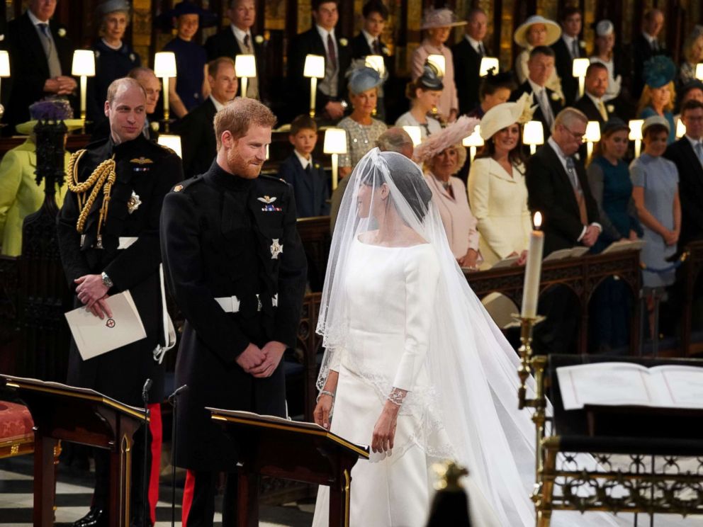 PHOTO: Prince Harry looks at his bride, Meghan Markle, as she arrives in St Georges Chapel at Windsor Castle for their wedding in Windsor, Britain, May 19, 2018.