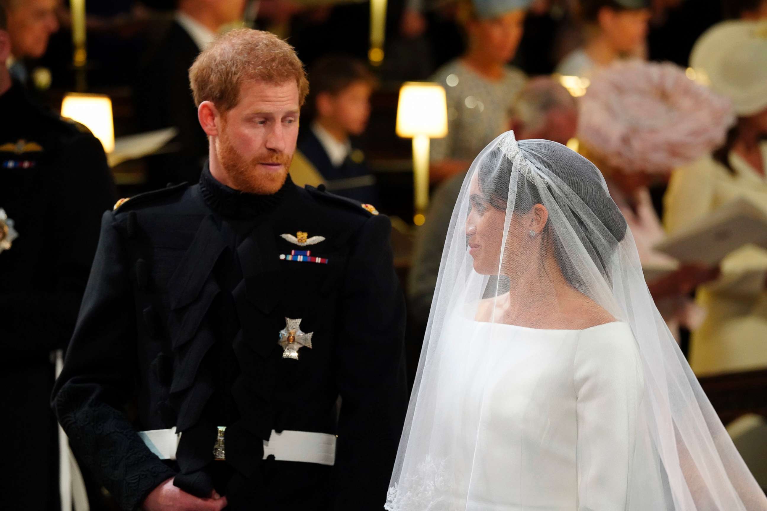 PHOTO: Prince Harry looks at his bride, Meghan Markle, during their wedding ceremony at St. George's Chapel in Windsor Castle in Windsor, May 19, 2018. 