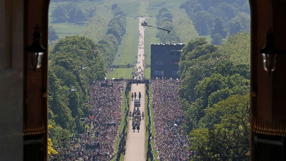 PHOTO: Meghan Markle and Prince Harry ride in an Ascot Landau carriage up the Long Walk at Windsor Castle after their wedding, May 19, 2018.