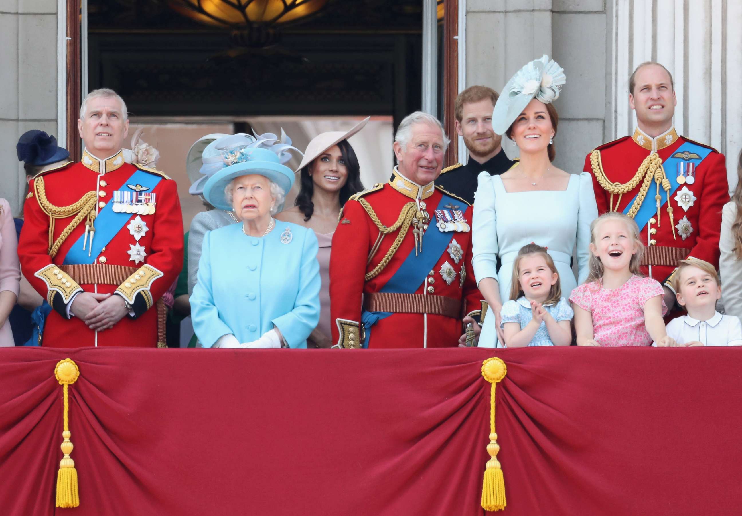 PHOTO: The royal family, including Queen Elizabeth II and Meghan, Duchess of Sussex, watch the flypast on the balcony of Buckingham Palace during Trooping The Colour on June 9, 2018 in London.
