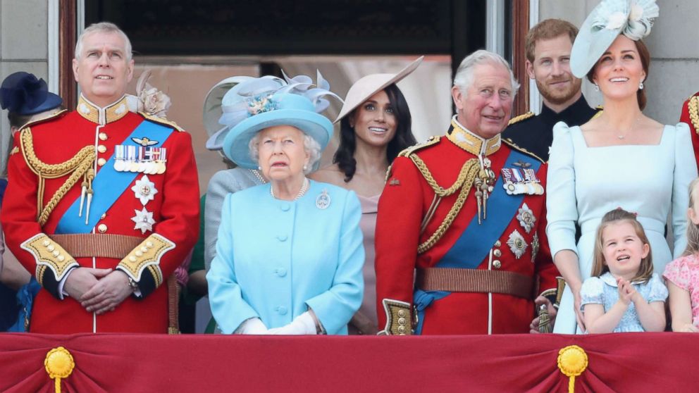 PHOTO: The royal family, including Queen Elizabeth II and Meghan, Duchess of Sussex, watch the flypast on the balcony of Buckingham Palace during Trooping The Colour on June 9, 2018 in London.