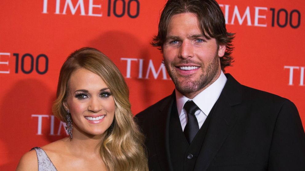 Carrie Underwood arrives with her husband, Mike Fisher, at the Time 100 gala in New York City on April 29, 2014.