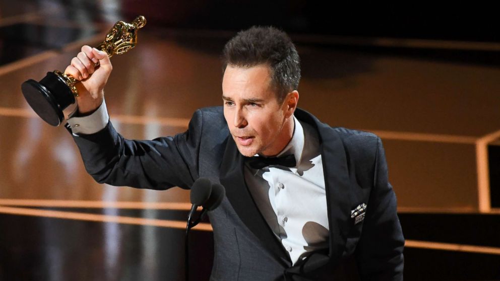 PHOTO: Sam Rockwell accepts the Oscar for performance by an actor in a supporting role for "Three Billboards outside Ebbing, Missouri" during the 90th Academy Awards at the Dolby Theatre.