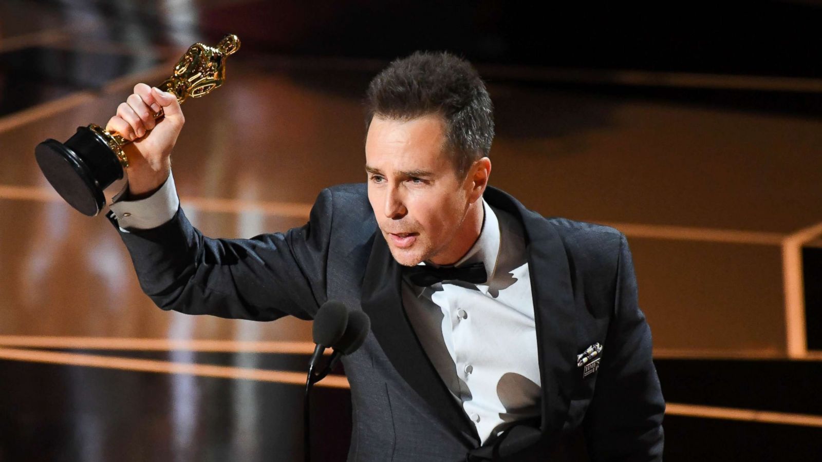 PHOTO: Sam Rockwell accepts the Oscar for performance by an actor in a supporting role for "Three Billboards outside Ebbing, Missouri" during the 90th Academy Awards at the Dolby Theatre.