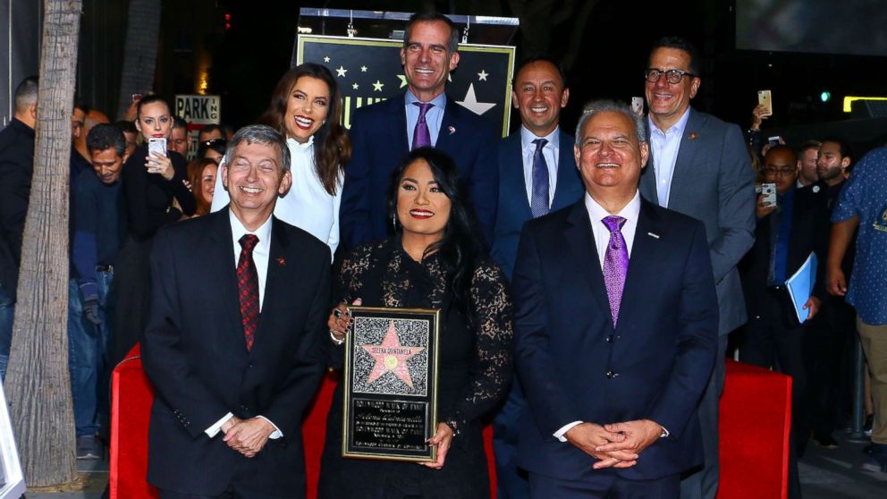Selena Quintanilla is posthumously honored with star on the Hollywood Walk of Fame in Los Angeles, Nov. 3, 2017. Pictured are Leron Gubler, Eva Longoria, Suzette Quintanilla, Eric Garcetti, Victor Gonzalez,  Otto Padron and guest. 
