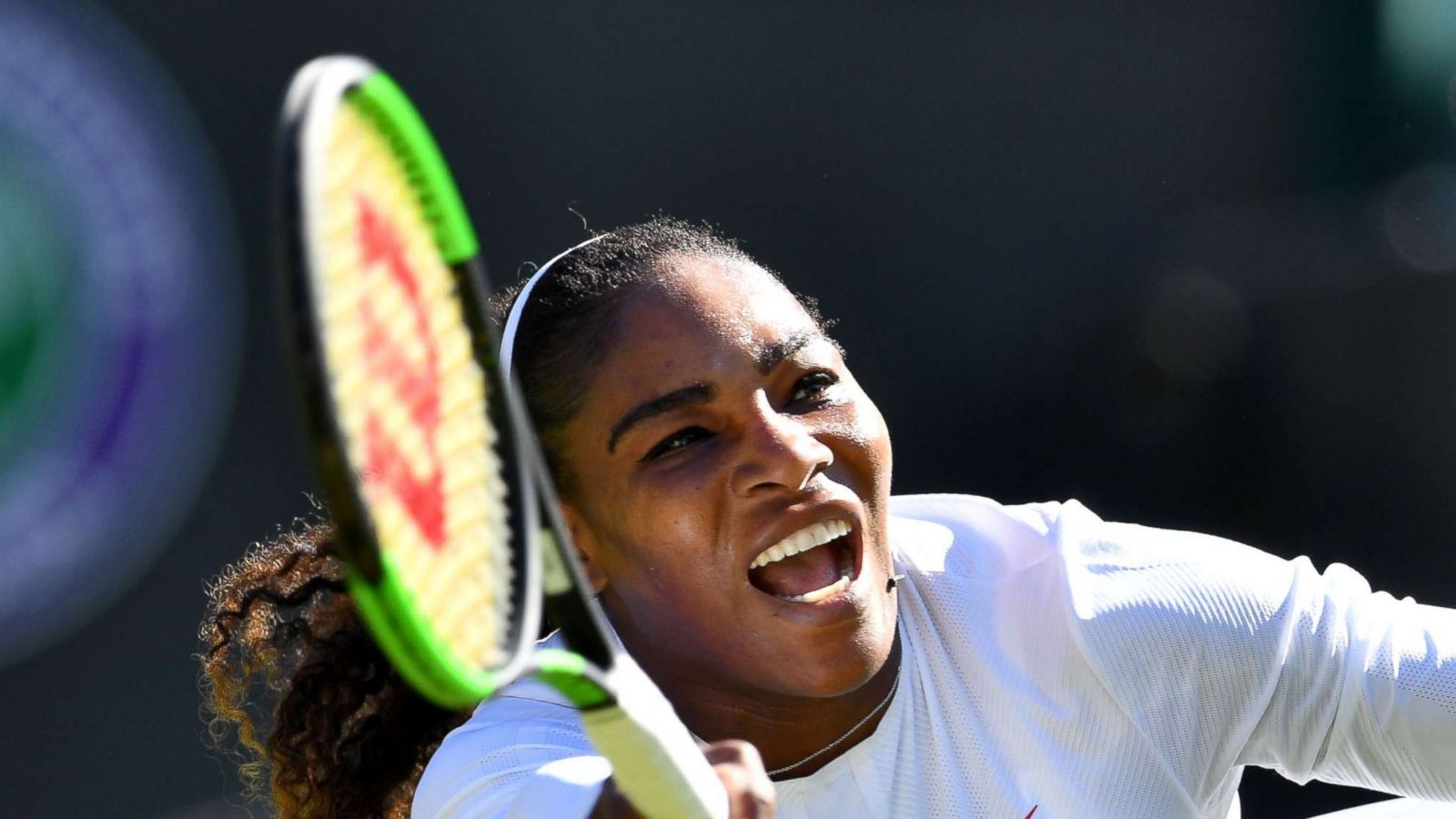 PHOTO: Serena Williams returns against Netherlands' Arantxa Rus during the women's singles first round match on the first day of the 2018 Wimbledon Championships at The All England Lawn Tennis Club in Wimbledon, southwest London, July 2, 2018.