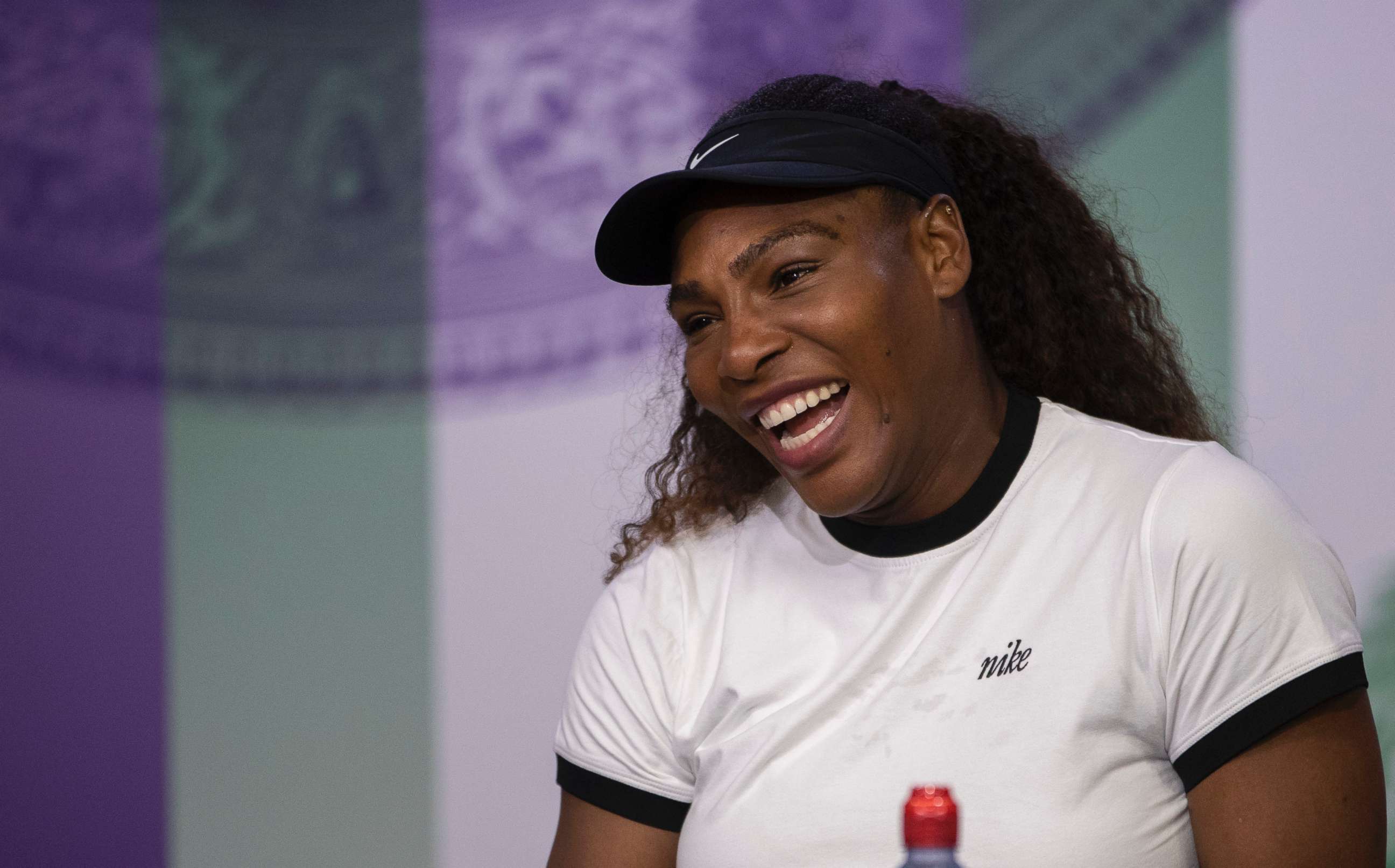 PHOTO: Serena Williams reacts during a press conference ahead of the Wimbledon Tennis Championships in London, July 1, 2018.