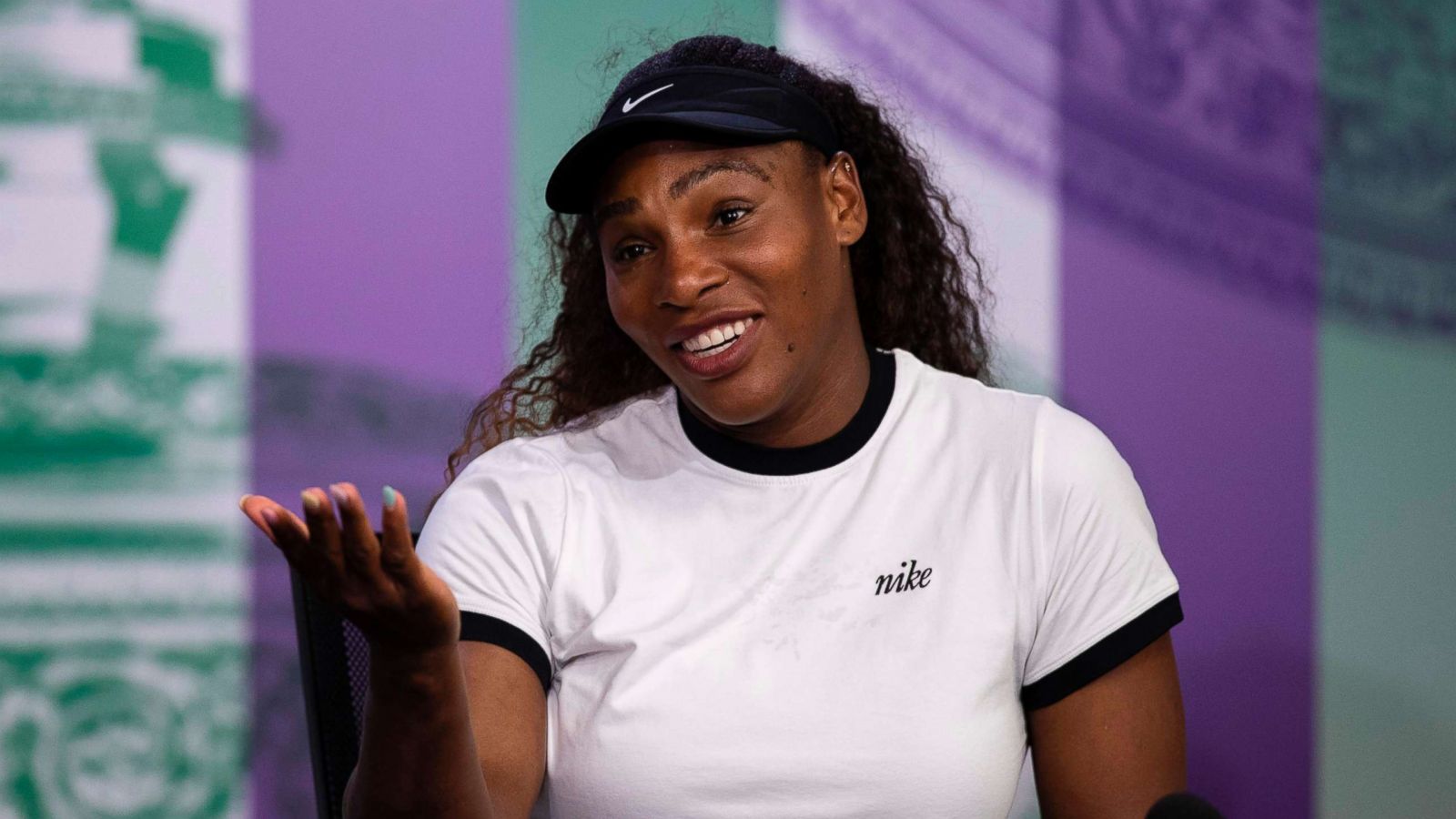 PHOTO: Serena Williams takes part in a press conference on the eve of the 2018 Wimbledon Championships at The All England Tennis Club in Wimbledon, London, on July 1, 2018.