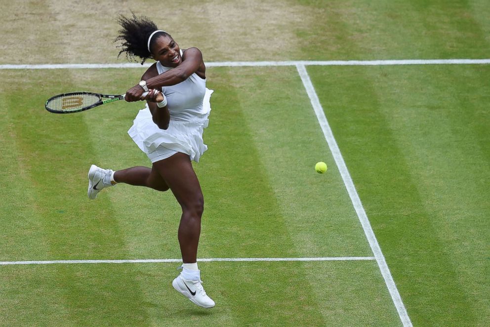 PHOTO: Serena Williams returns against Germany's Angelique Kerber during the women's singles final on the thirteenth day of the 2016 Wimbledon Championships at The All England Lawn Tennis Club in Wimbledon, southwest London, on July 9, 2016.