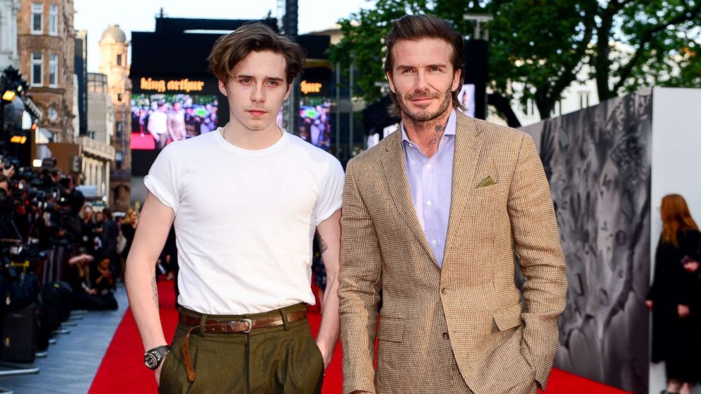 PHOTO: Brooklyn Beckham and David Beckham attend the premier of "King Arthur Legend of the Sword," in London, May 10, 2017.
