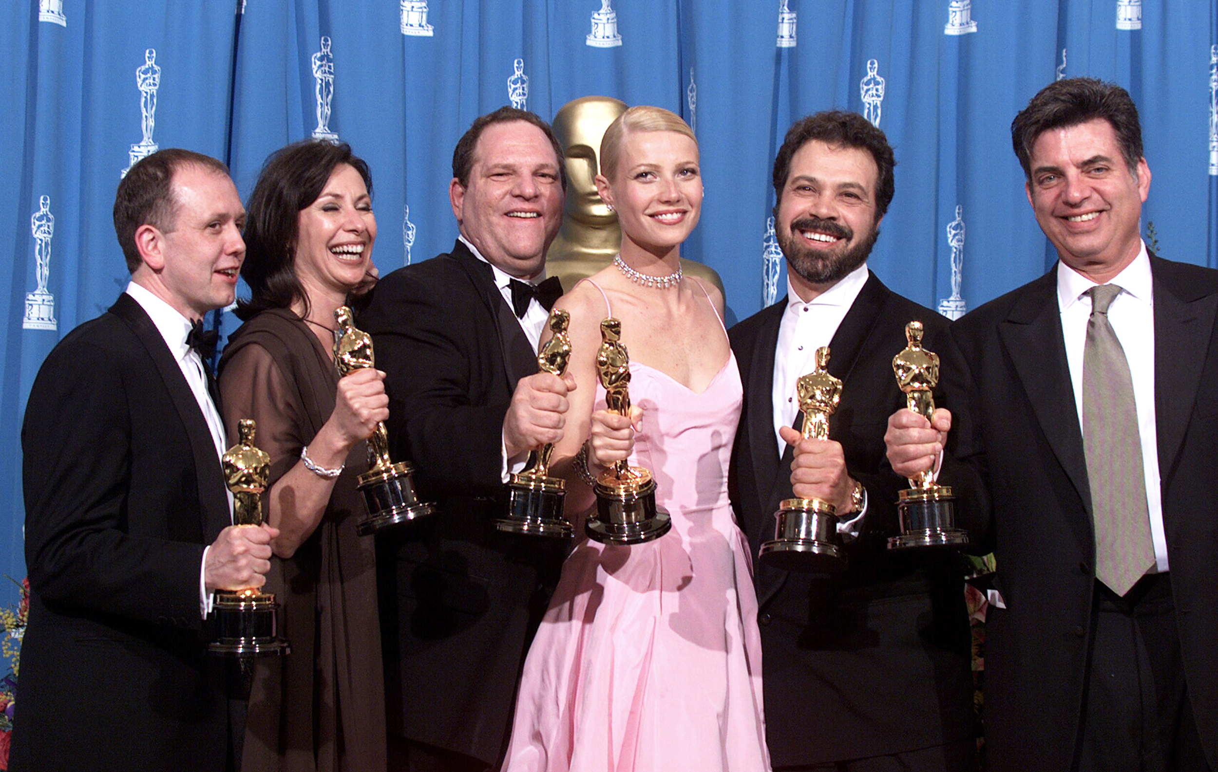 PHOTO: "Shakespeare in Love" Best Actress winner Gwyneth Paltrow (center) is joined by Harvey Weinstein (center left)  and other stars as they celebrated their win of Best Picture at the 1999 Academy Awards in Hollywood, Calif., on March 21, 1999.