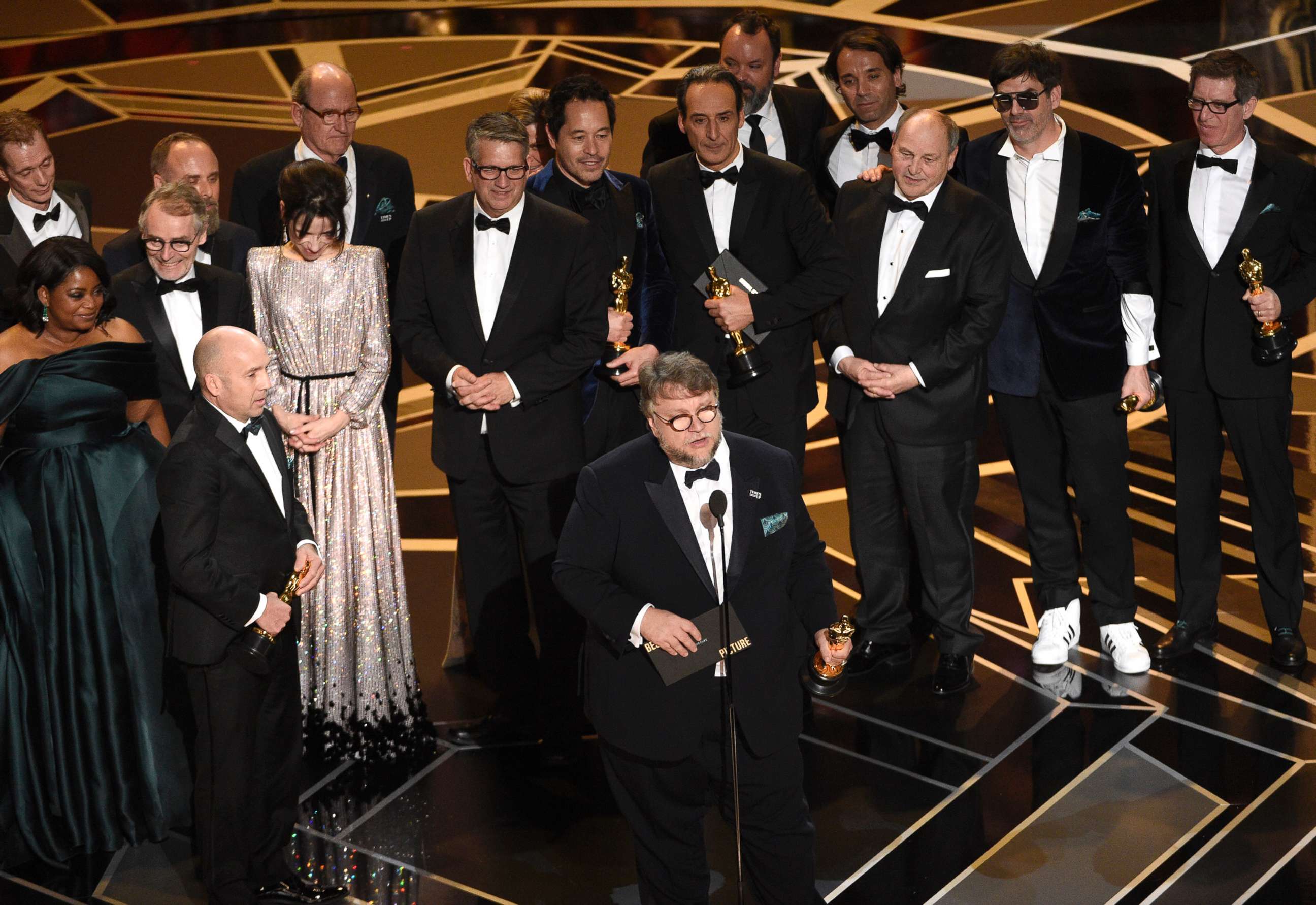 PHOTO: Guillermo del Toro and the cast and crew of "The Shape of Water" accept the award for best picture at the Oscars, March 4, 2018, at the Dolby Theatre in Los Angeles.  