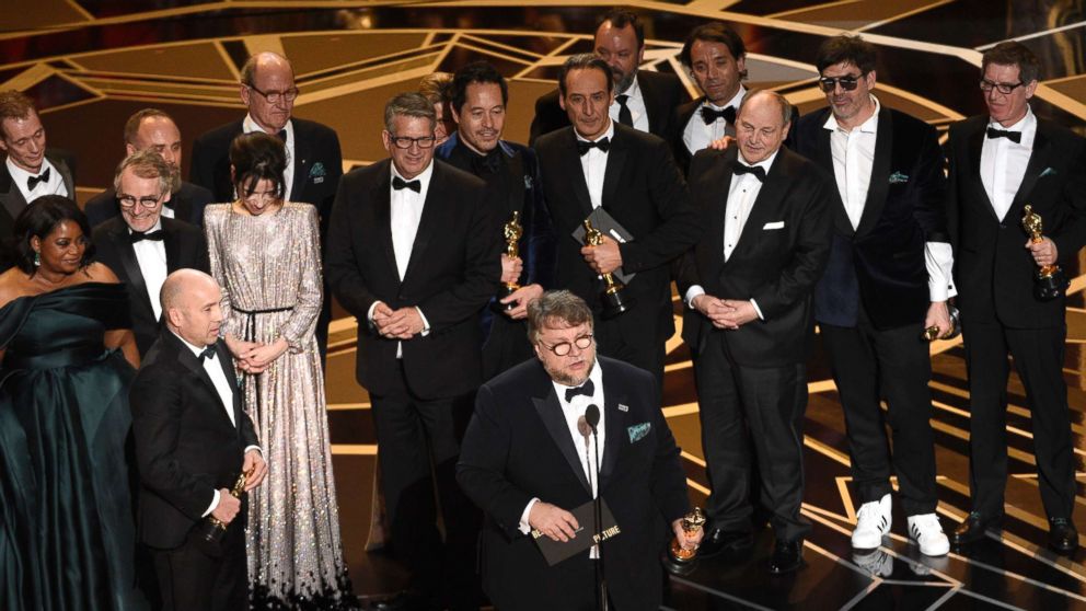 PHOTO: Guillermo del Toro and the cast and crew of "The Shape of Water" accept the award for best picture at the Oscars, March 4, 2018, at the Dolby Theatre in Los Angeles.  