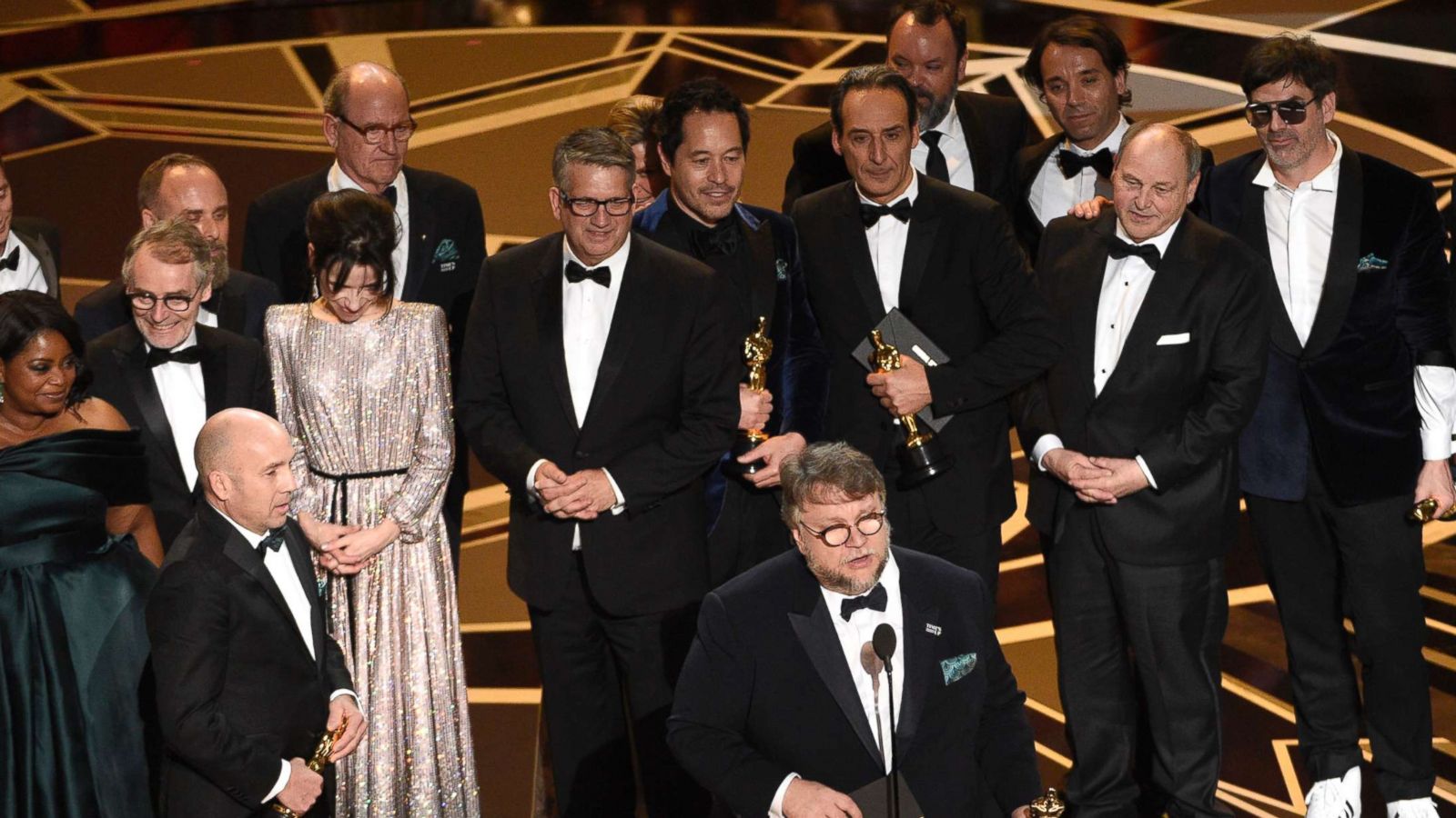 PHOTO: Guillermo del Toro and the cast and crew of "The Shape of Water" accept the award for best picture at the Oscars, March 4, 2018, at the Dolby Theatre in Los Angeles.