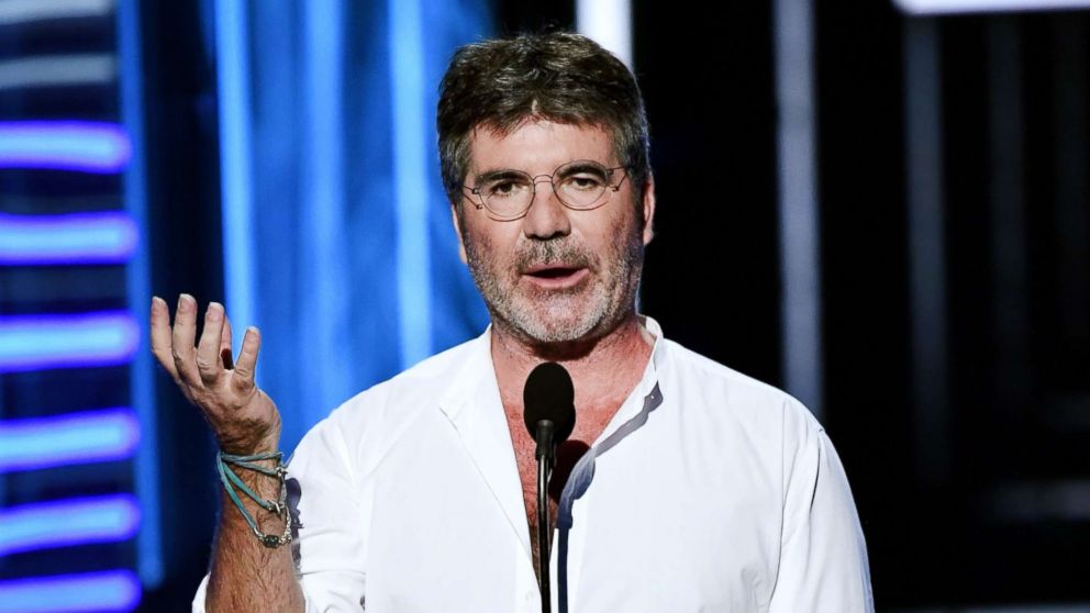 PHOTO: Producer-TV personality Simon Cowell speaks onstage during the 2018 Billboard Music Awards at MGM Grand Garden Arena, May 20, 2018 in Las Vegas, Nevada. 