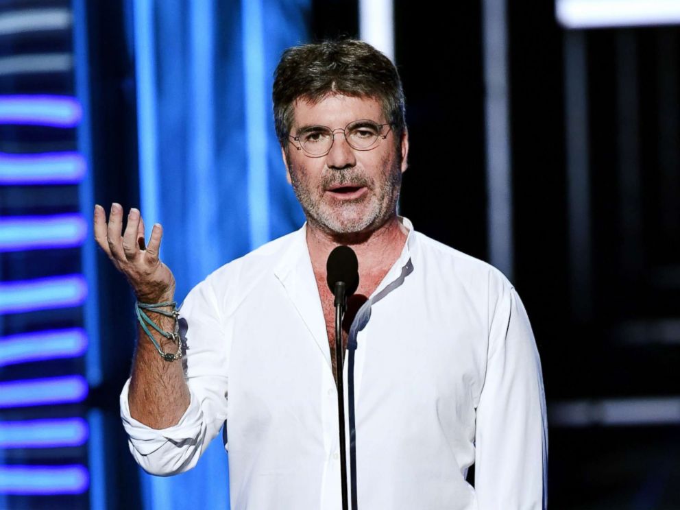 PHOTO: Producer-TV personality Simon Cowell speaks onstage during the 2018 Billboard Music Awards at MGM Grand Garden Arena, May 20, 2018 in Las Vegas, Nevada.
