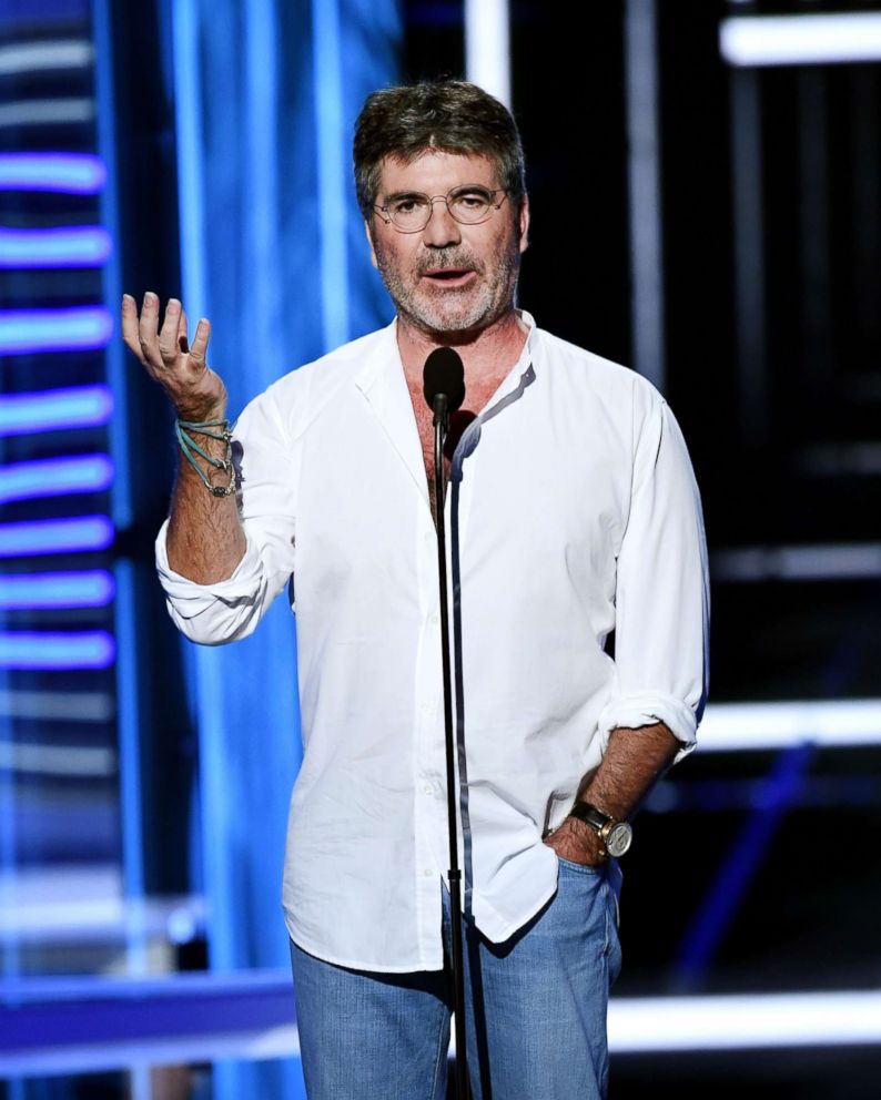 PHOTO: Producer-TV personality Simon Cowell speaks onstage during the 2018 Billboard Music Awards at MGM Grand Garden Arena, May 20, 2018 in Las Vegas, Nevada.  