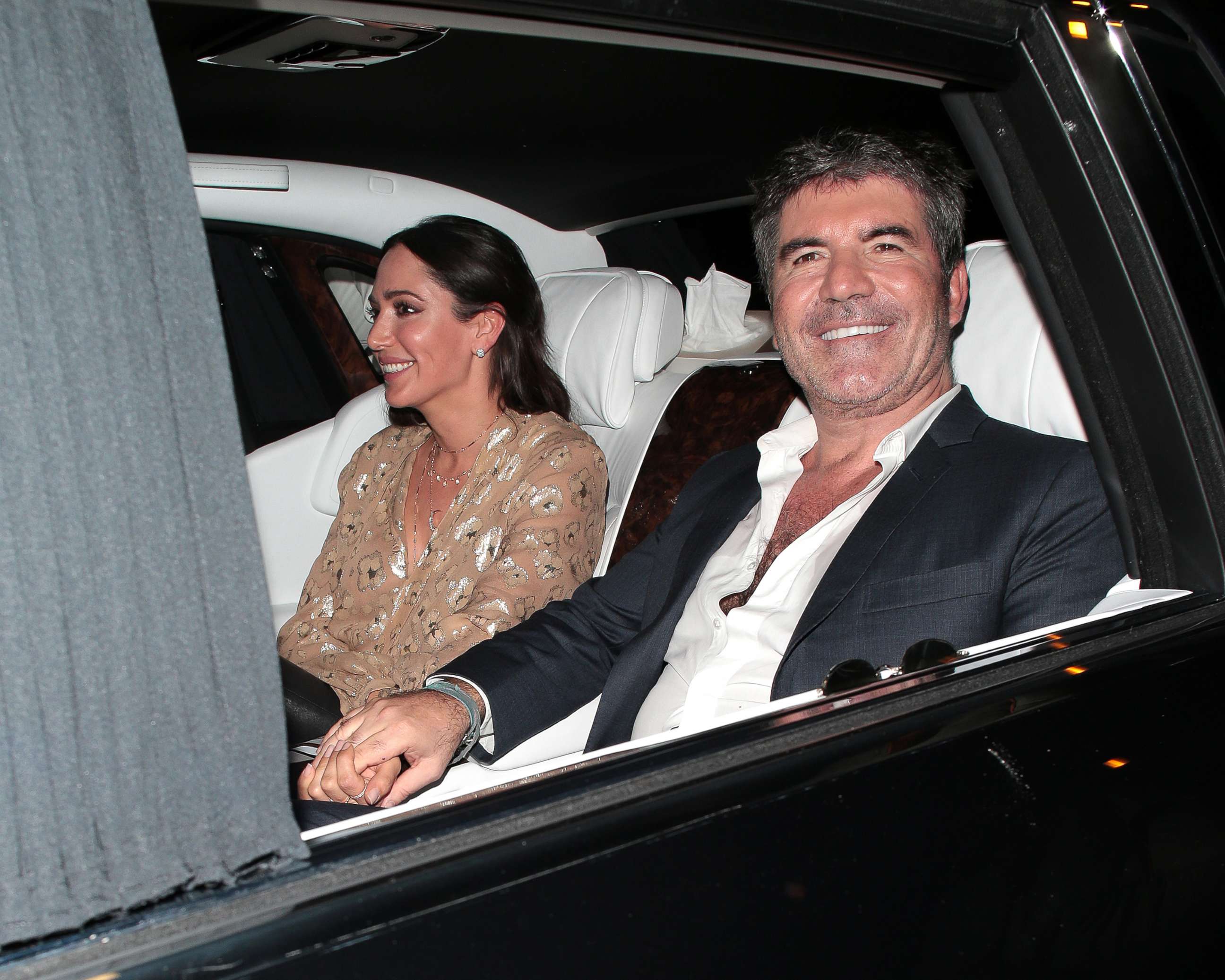 PHOTO: Lauren Silverman and Simon Cowell seen leaving Hammersmith Apollo after Britain's Got Talent - semi final day 3, May 30, 2018 in London, England. 