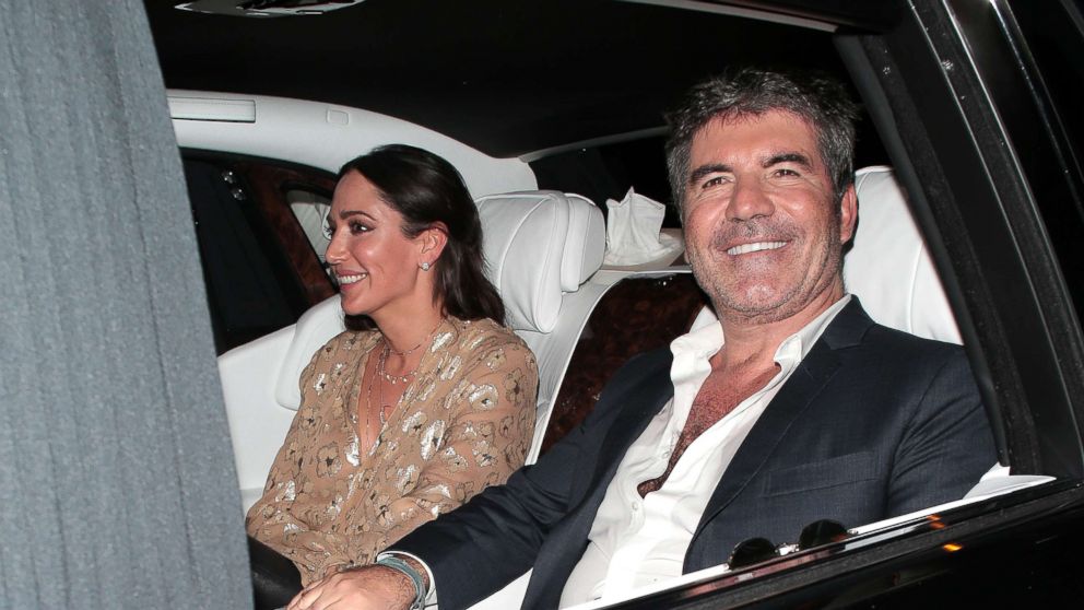 PHOTO: Lauren Silverman and Simon Cowell seen leaving Hammersmith Apollo after Britain's Got Talent - semi final day 3, May 30, 2018 in London, England. 