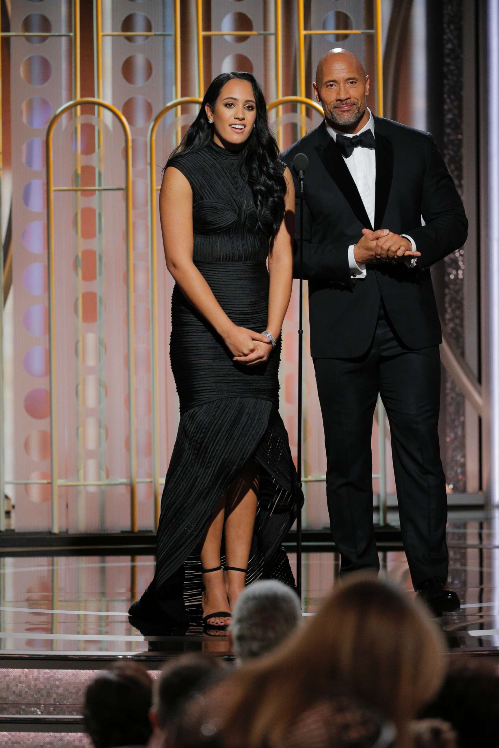 PHOTO: Golden Globe Ambassador Simone Garcia Johnson and her father Dwayne Johnson speak onstage during the 75th Annual Golden Globe Awards on Jan. 7, 2018 in Beverly Hills, Calif.