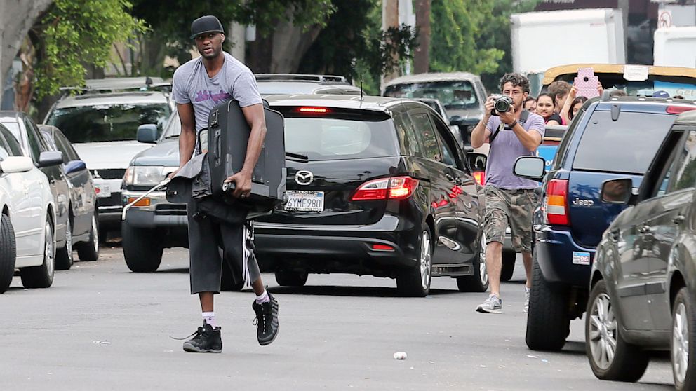 Lamar Odom became angry at a photographer that was in his gated community, Los Angeles, July 10, 2013. 