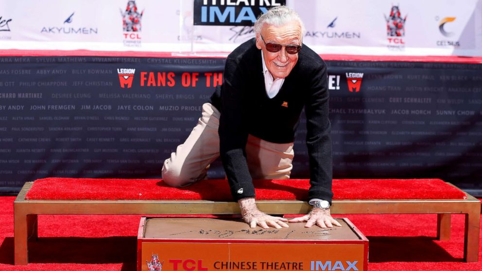 PHOTO: Marvel Comics co-creator Stan Lee places his handprints in cement during a ceremony at the TCL Chinese theatre in Los Angeles, July 18, 2017.   