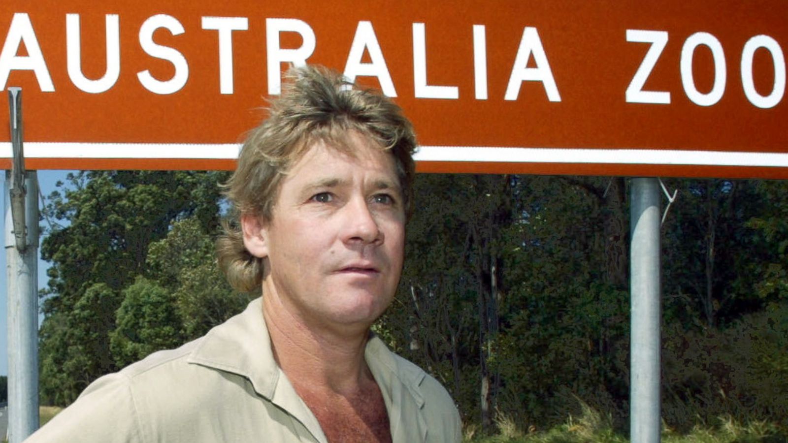 PHOTO: In this file photo, 'Crocodile Hunter' Steve Irwin stands by the Australia Zoo sign at Beerwah on the Sunshine Coast, Sept. 26, 2003.