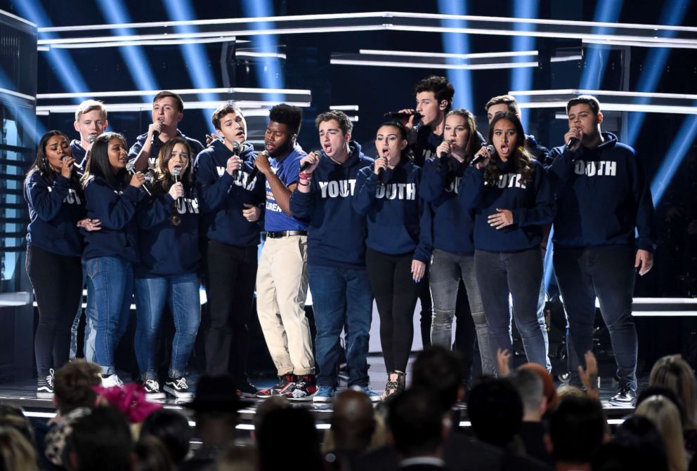 PHOTO: Khalid, and Shawn Mendes, perform "Youth" with the Stoneman Douglas choir, of the Marjory Stoneman Douglas High School at the Billboard Music Awards, May 20, 2018, in Las Vegas. 