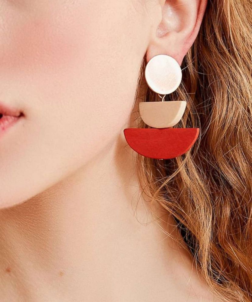 PHOTO: Wear the sculptural earring trend as easily as you wear hoops—pair them with everything. 