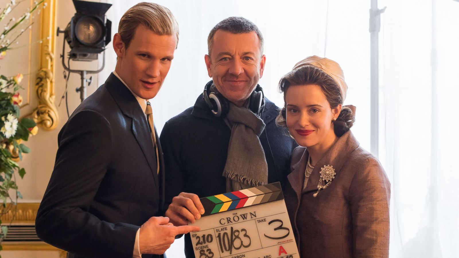 PHOTO: Matt Smith and Claire Foy pose for a photo with the creator of "The Crown," Peter Morgan.