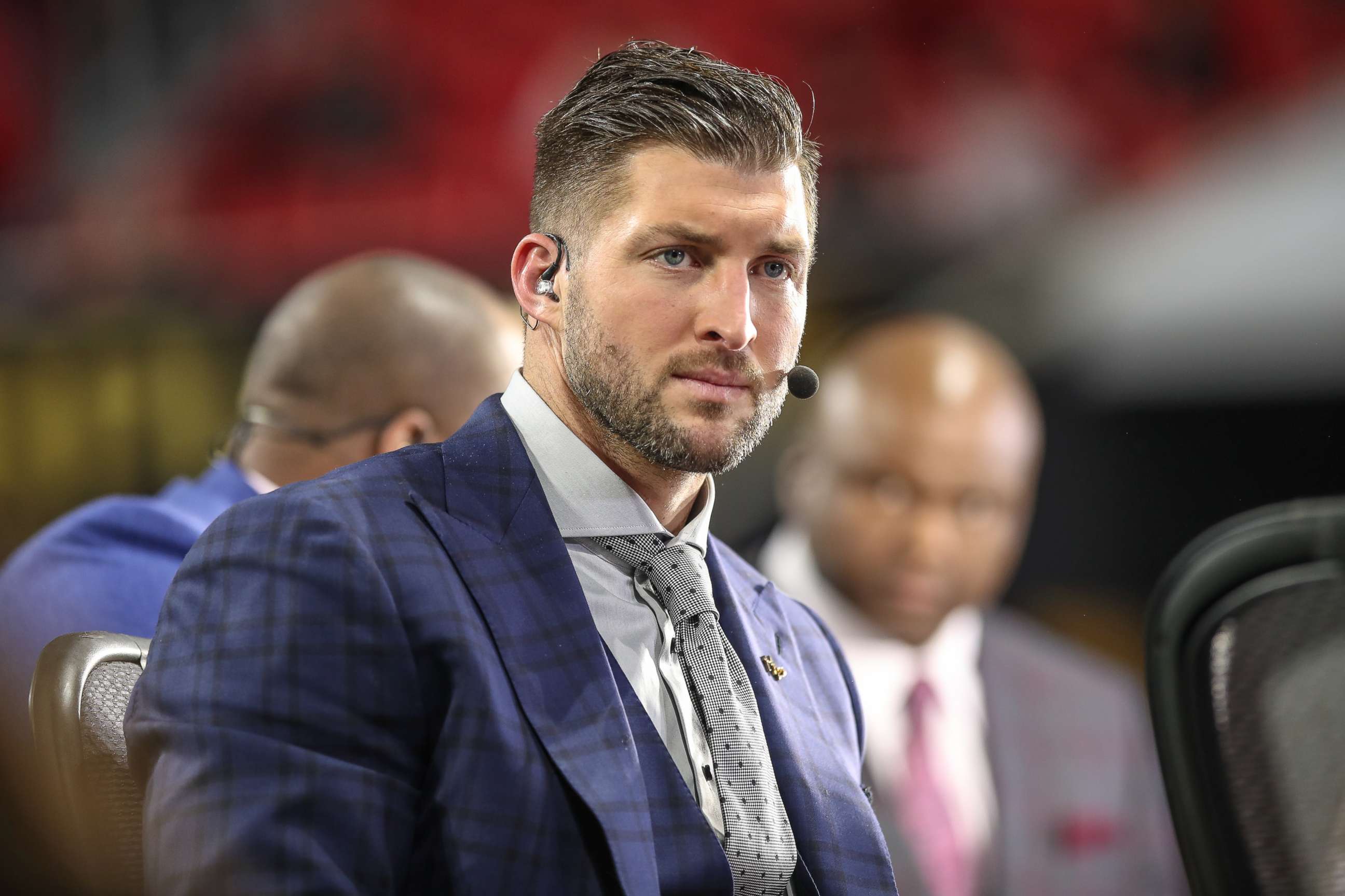 PHOTO: Tim Tebow looks on before the College Football Playoff National Championship Game between the Alabama Crimson Tide and the Georgia Bulldogs on January 8, 2018 at Mercedes-Benz Stadium in Atlanta, GA.